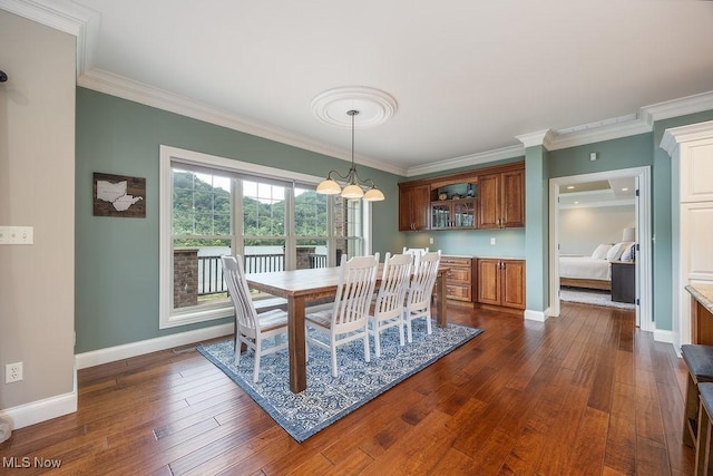 390 Powell Riverfront Rd, Saint Marys, WV 26170 - dining room featuring dark wood-style floors and ornamental molding