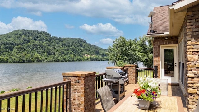 390 Powell Riverfront Rd, Saint Marys, WV 26170 - wooden deck with a water view, a forest view, a grill, and a yard