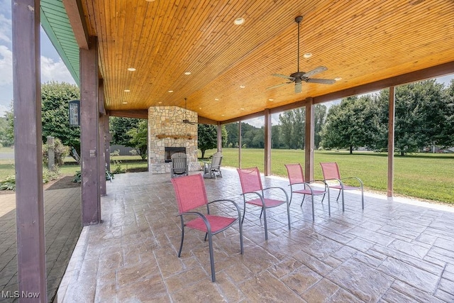390 Powell Riverfront Rd, Saint Marys, WV 26170 - view of patio / terrace with an outdoor stone fireplace and ceiling fan