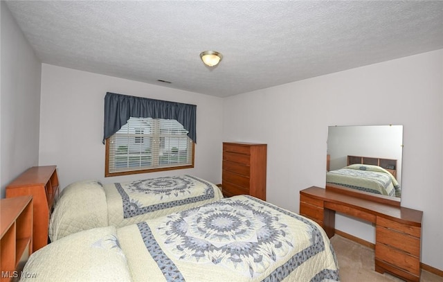 1412 Tewksbury Cir Unit 1C, Cuyahoga Falls, OH 44221 - bedroom with carpet floors and a textured ceiling