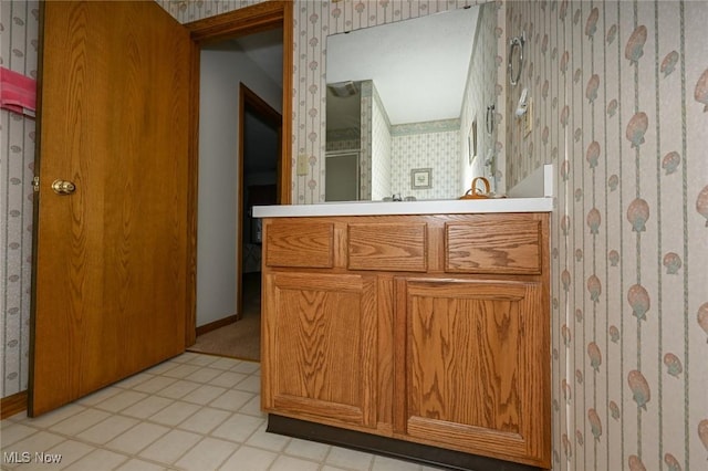1412 Tewksbury Cir Unit 1C, Cuyahoga Falls, OH 44221 - full bathroom featuring wallpapered walls, vanity, and a shower with door