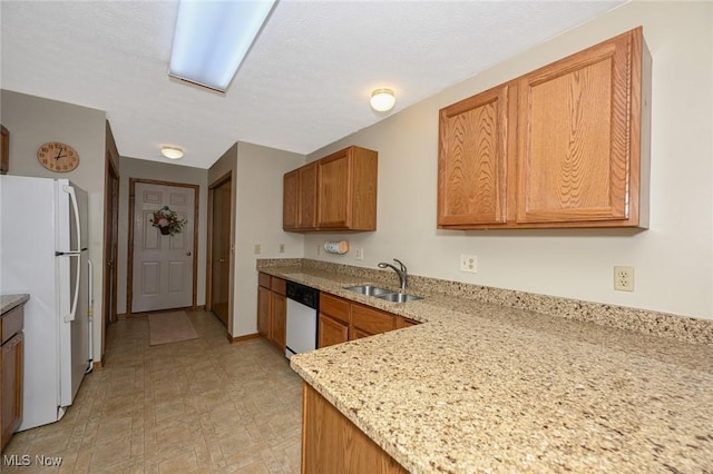 1412 Tewksbury Cir Unit 1C, Cuyahoga Falls, OH 44221 - kitchen with white appliances, light stone countertops, light flooring, and brown cabinets