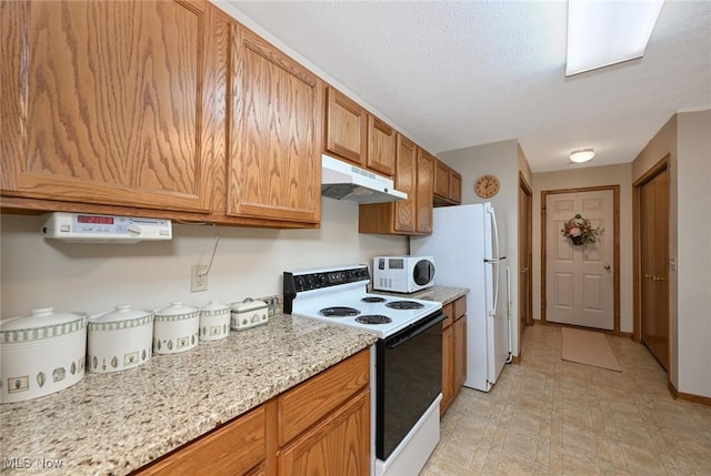 1412 Tewksbury Cir Unit 1C, Cuyahoga Falls, OH 44221 - kitchen featuring white appliances, under cabinet range hood, brown cabinetry, and light stone countertops