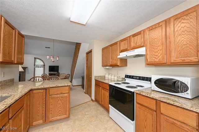 1412 Tewksbury Cir Unit 1C, Cuyahoga Falls, OH 44221 - kitchen with white appliances, under cabinet range hood, a chandelier, a peninsula, and light stone counters