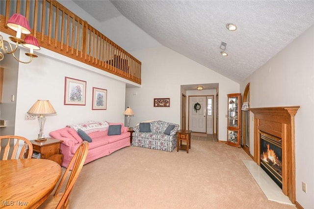 1412 Tewksbury Cir Unit 1C, Cuyahoga Falls, OH 44221 - living area featuring carpet, high vaulted ceiling, a fireplace with flush hearth, and a textured ceiling