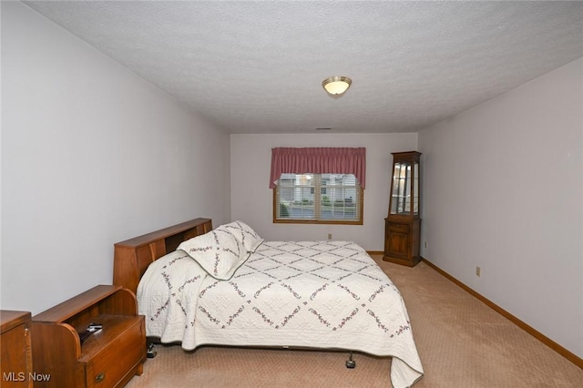 1412 Tewksbury Cir Unit 1C, Cuyahoga Falls, OH 44221 - bedroom with light colored carpet and baseboards