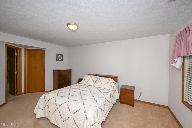 1412 Tewksbury Cir Unit 1C, Cuyahoga Falls, OH 44221 - bedroom with light colored carpet and a textured ceiling