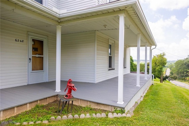 6248 Massillon Rd SW, Navarre, OH 44662 - porch featuring a lawn