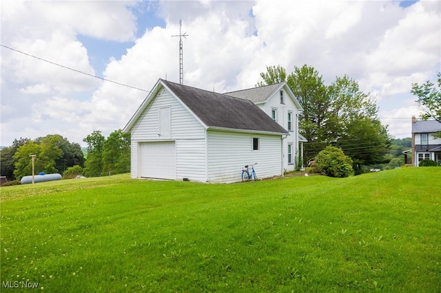 6248 Massillon Rd SW, Navarre, OH 44662 - view of property exterior featuring a yard, a shingled roof, and a garage