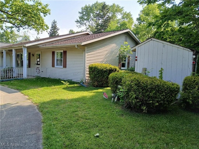 1403 Dorchester Dr, Madison, OH 44057 - ranch-style home featuring a front lawn and covered porch