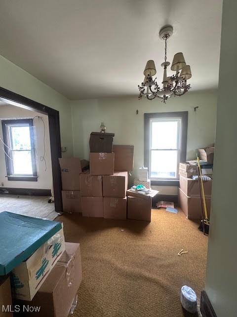 195 Water St, Wadsworth, OH 44281 - dining space with a chandelier and carpet