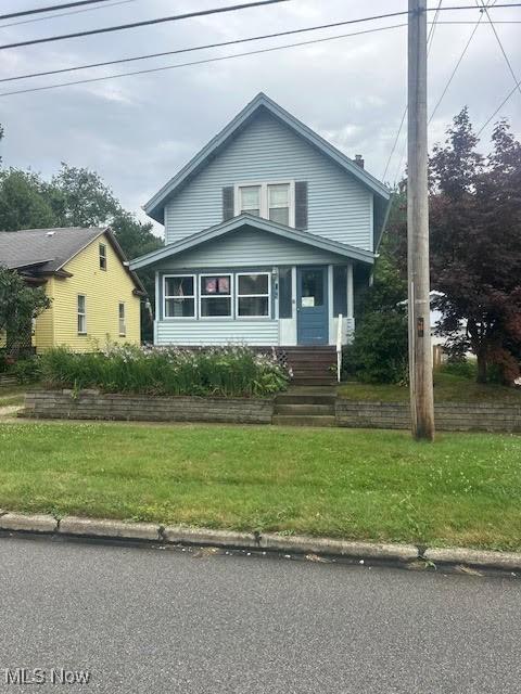 195 Water St, Wadsworth, OH 44281 - view of front of property featuring a front lawn