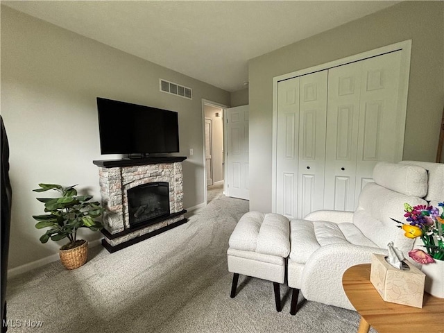 1314 Wellingshire Cir, Cuyahoga Falls, OH 44221 - living room featuring carpet and a stone fireplace