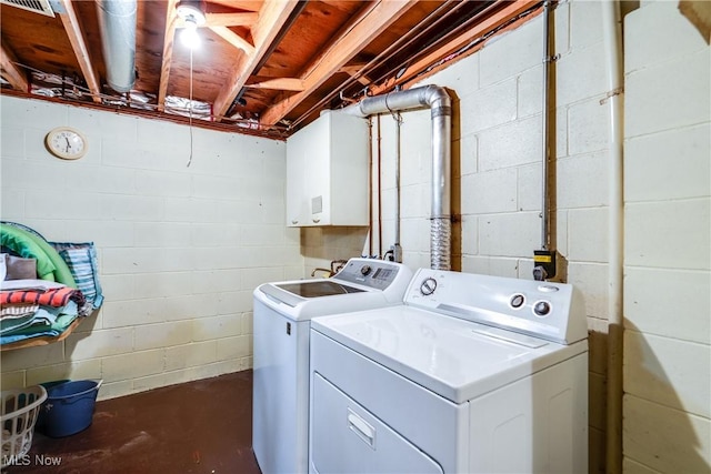10154 Carlswood Ave NE, Hartville, OH 44632 - washroom with washer and dryer and cabinet space