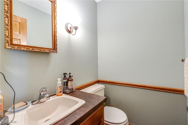 10154 Carlswood Ave NE, Hartville, OH 44632 - bathroom featuring toilet and vanity