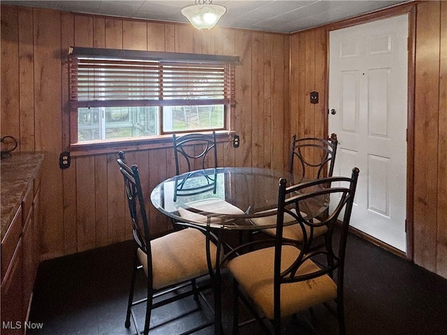 507 Harker Ave, Newell, WV 26050 - dining room featuring wood walls