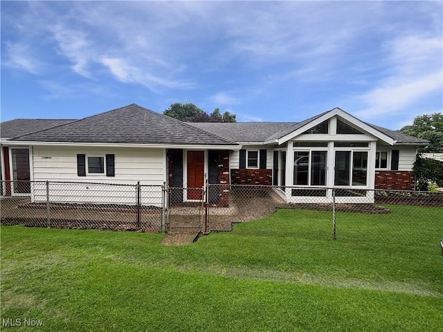 507 Harker Ave, Newell, WV 26050 - back of house featuring brick siding, roof with shingles, and a sunroom