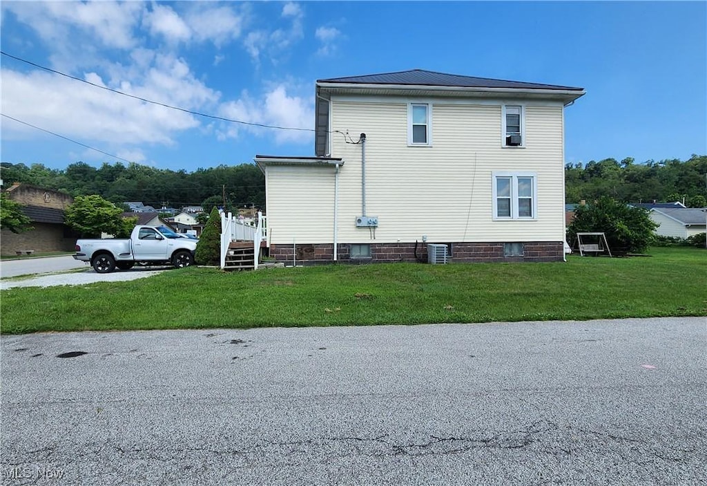 201 Ohio St, Brilliant, OH 43913 - view of property exterior featuring a yard
