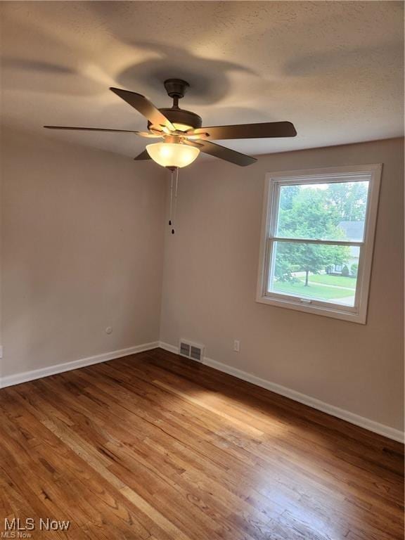 16805 Scottsdale Blvd, Shaker Heights, OH 44120 - spare room with wood finished floors and ceiling fan