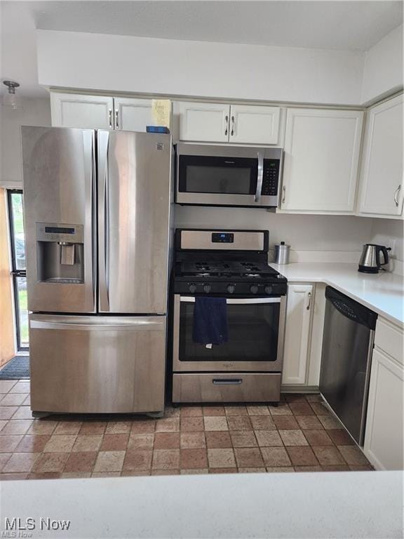 16805 Scottsdale Blvd, Shaker Heights, OH 44120 - kitchen featuring appliances with stainless steel finishes, white cabinets, and light countertops