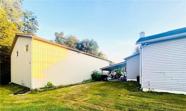617 Valley St, Minerva, OH 44657 - view of home's exterior featuring a chimney and a lawn