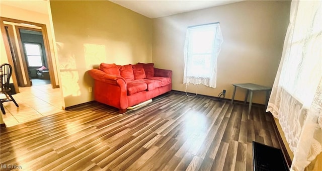 617 Valley St, Minerva, OH 44657 - living area featuring plenty of natural light and wood finished floors