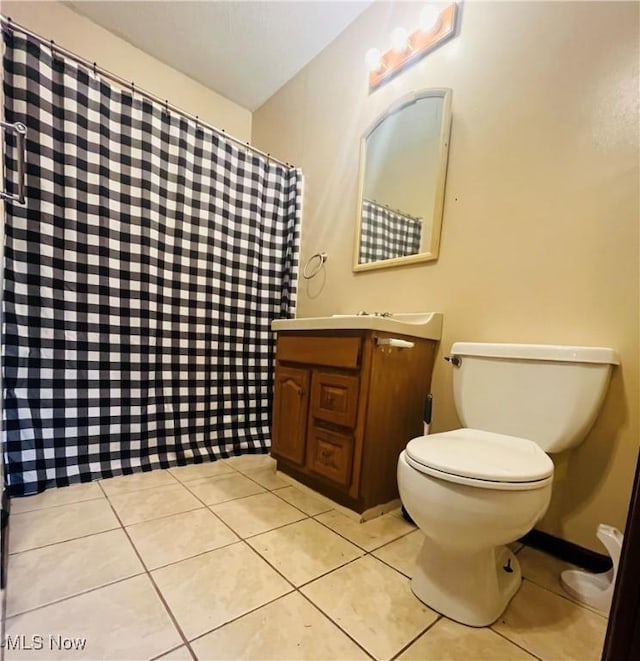 617 Valley St, Minerva, OH 44657 - bathroom with vanity, tile patterned floors, and a shower with curtain