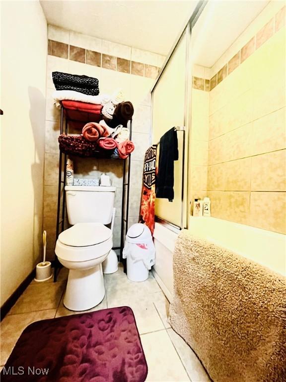 617 Valley St, Minerva, OH 44657 - full bathroom with tile patterned flooring and shower / tub combination