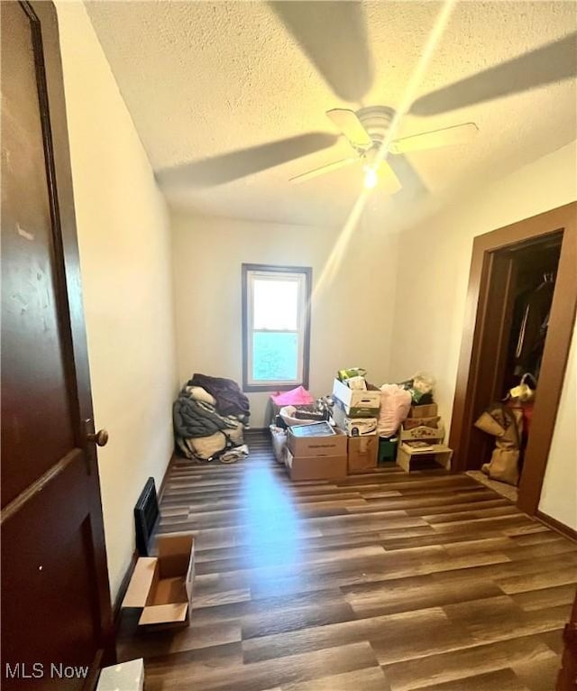 617 Valley St, Minerva, OH 44657 - additional living space featuring a ceiling fan, wood finished floors, and a textured ceiling
