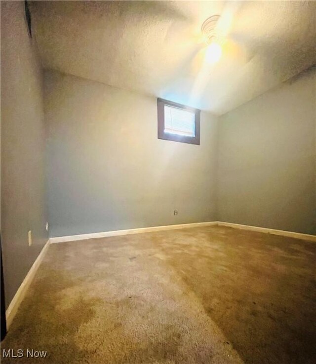 617 Valley St, Minerva, OH 44657 - spare room featuring carpet and baseboards