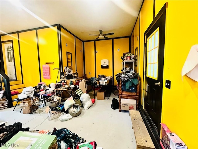 617 Valley St, Minerva, OH 44657 - miscellaneous room featuring a ceiling fan and concrete floors