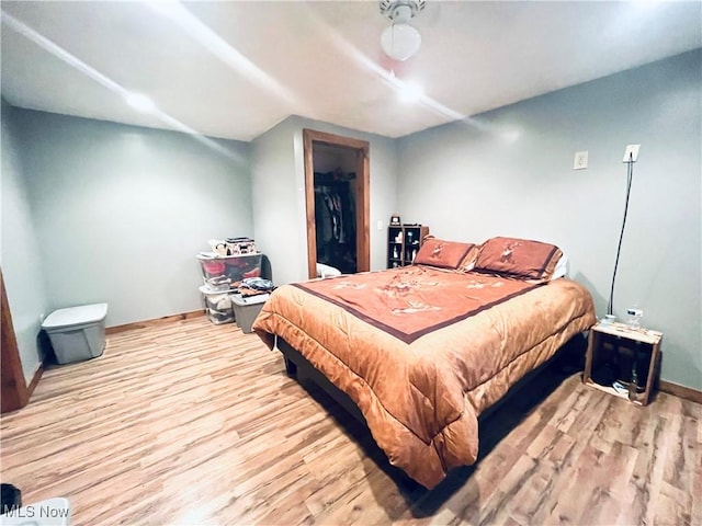 617 Valley St, Minerva, OH 44657 - bedroom with wood finished floors, vaulted ceiling, and a ceiling fan