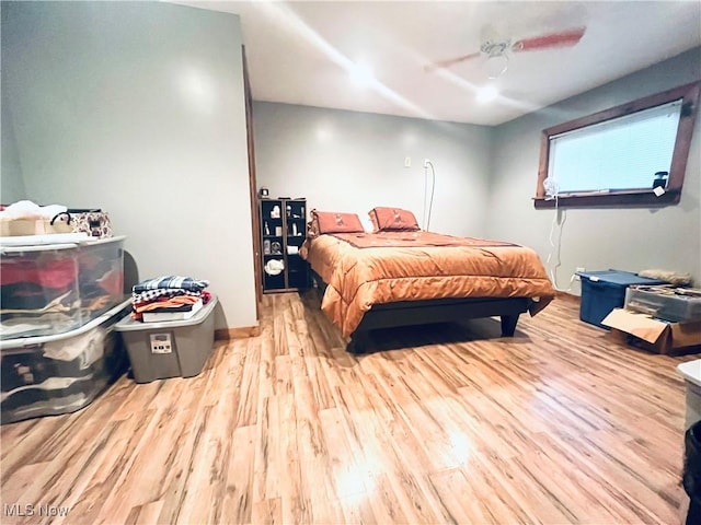 617 Valley St, Minerva, OH 44657 - bedroom with wood finished floors and ceiling fan