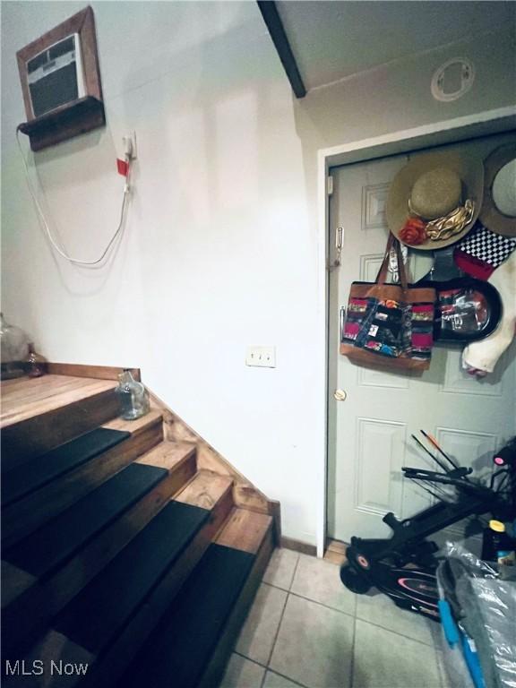 617 Valley St, Minerva, OH 44657 - staircase featuring tile patterned floors