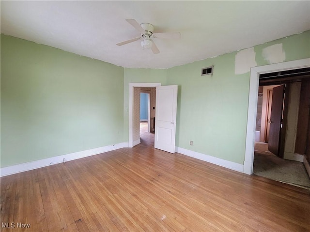 1707 23rd St, Parkersburg, WV 26101 - unfurnished room featuring light wood-style floors and a ceiling fan