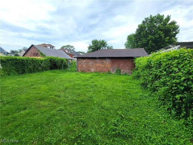 1707 23rd St, Parkersburg, WV 26101 - view of green lawn featuring an outbuilding