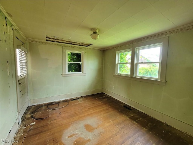 1707 23rd St, Parkersburg, WV 26101 - unfurnished room featuring hardwood / wood-style flooring and baseboards