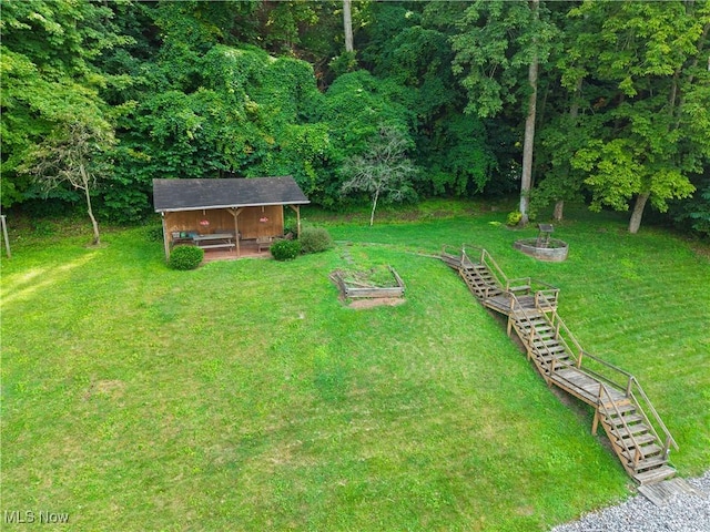 355 Muskingum River Rd, Marietta, OH 45750 - view of green lawn featuring an outdoor structure and stairs
