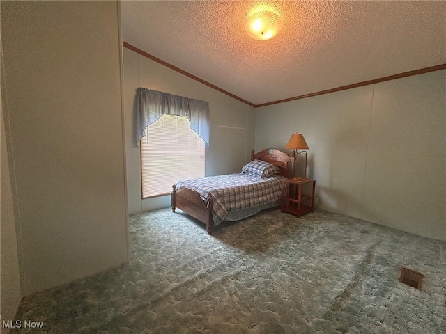 355 Muskingum River Rd, Marietta, OH 45750 - carpeted bedroom featuring ornamental molding, vaulted ceiling, and a textured ceiling