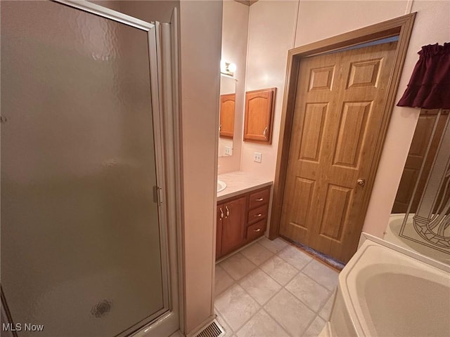 355 Muskingum River Rd, Marietta, OH 45750 - bathroom with a stall shower, vanity, and a garden tub