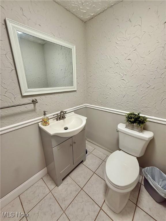 153 Lowes Dr, New Cumberland, WV 26047 - half bathroom featuring vanity and tile patterned floors