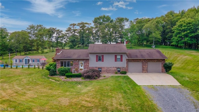 153 Lowes Dr, New Cumberland, WV 26047 - tri-level home featuring concrete driveway, brick siding, a front lawn, and a chimney