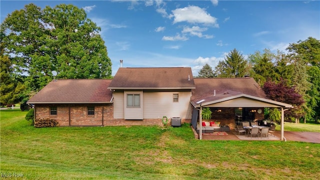 153 Lowes Dr, New Cumberland, WV 26047 - rear view of property with a yard, a patio, brick siding, and a shingled roof