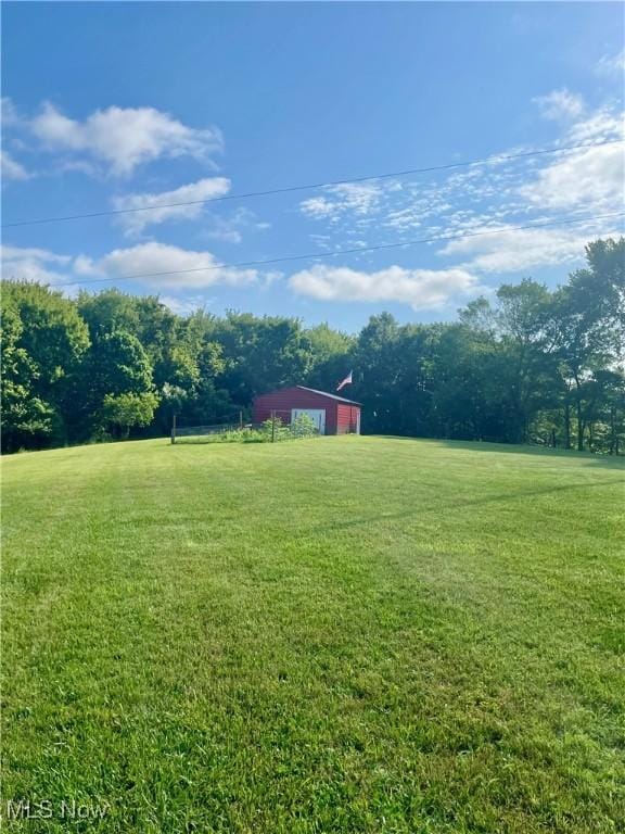 153 Lowes Dr, New Cumberland, WV 26047 - view of green lawn featuring an outbuilding and a pole building