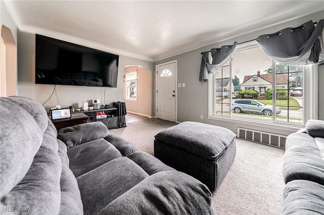 8006 Chesterfield Ave, Parma, OH 44129 - carpeted living area featuring arched walkways