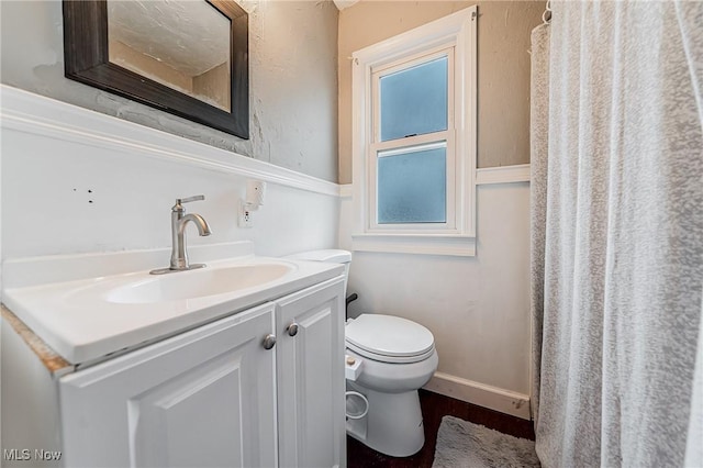 8006 Chesterfield Ave, Parma, OH 44129 - full bath featuring vanity and wood finished floors