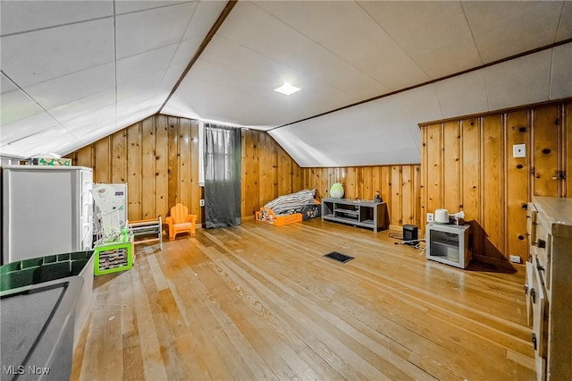 8006 Chesterfield Ave, Parma, OH 44129 - bonus room featuring light wood-style flooring, wooden walls, and vaulted ceiling