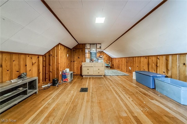 8006 Chesterfield Ave, Parma, OH 44129 - bonus room featuring wood-type flooring, wooden walls, and lofted ceiling