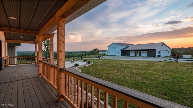 52110 Spencer Rd, Cumberland, OH 43732 - wooden deck featuring a lawn and a garage
