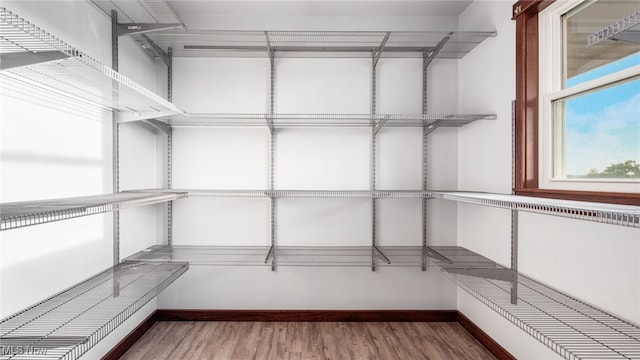 52110 Spencer Rd, Cumberland, OH 43732 - spacious closet featuring wood finished floors